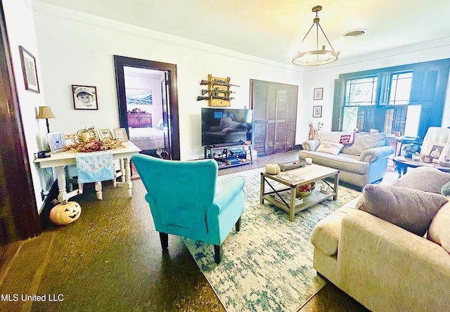 living room with a notable chandelier