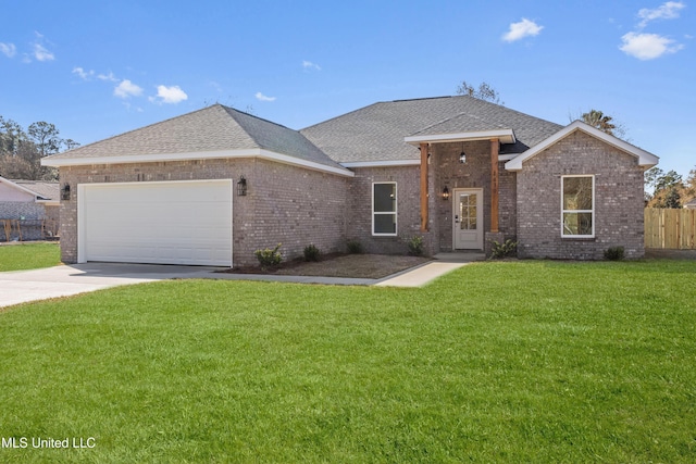 single story home with a garage and a front yard