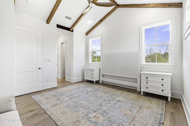 211 Chartres St, Bay Saint Louis, MS 39520 - unfurnished bedroom with wood finished floors and baseboards