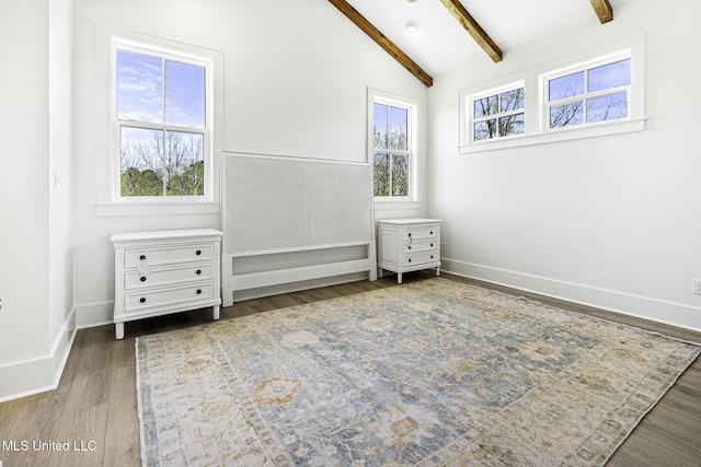 211 Chartres St, Bay Saint Louis, MS 39520 - unfurnished bedroom featuring wood finished floors and baseboards
