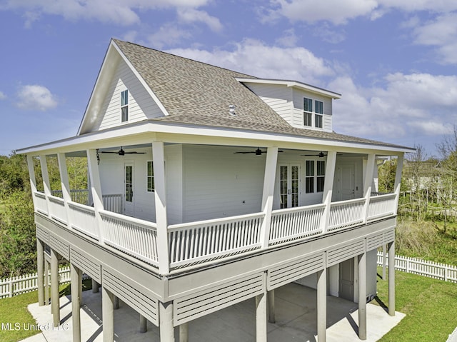 211 Chartres St, Bay Saint Louis, MS 39520 - rear view of property featuring a ceiling fan, roof with shingles, and a patio area