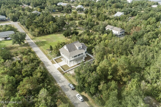 211 Chartres St, Bay Saint Louis, MS 39520 - view of property location featuring a forest