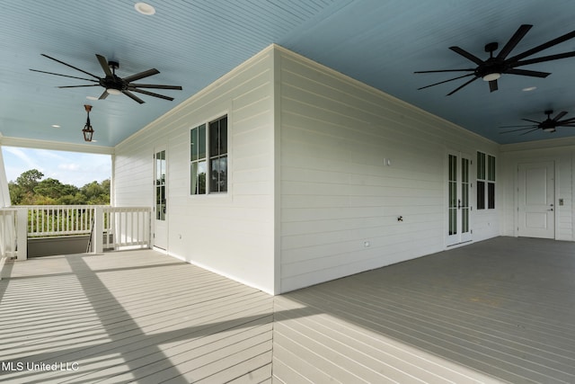 211 Chartres St, Bay Saint Louis, MS 39520 - deck with ceiling fan and french doors