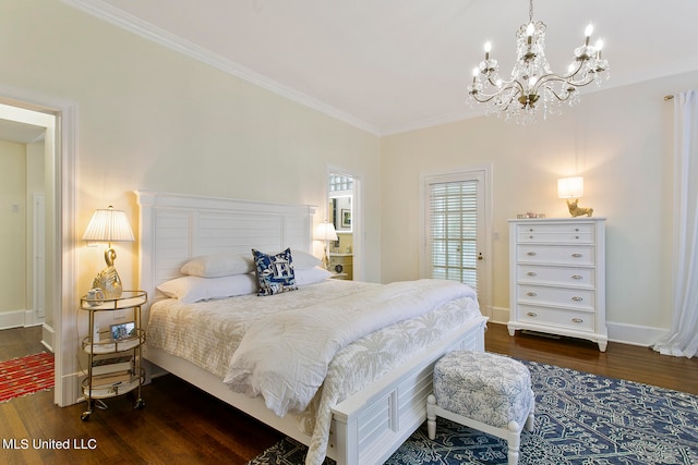 bedroom featuring ornamental molding, an inviting chandelier, and dark hardwood / wood-style flooring