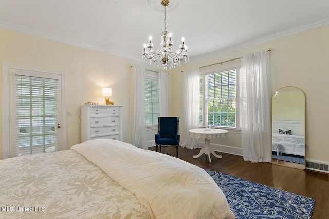 bedroom with crown molding, a notable chandelier, and dark wood-type flooring