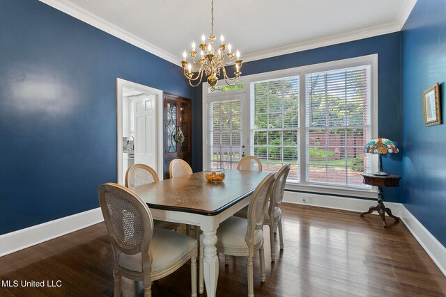 dining room featuring an inviting chandelier, ornamental molding, a healthy amount of sunlight, and dark hardwood / wood-style flooring