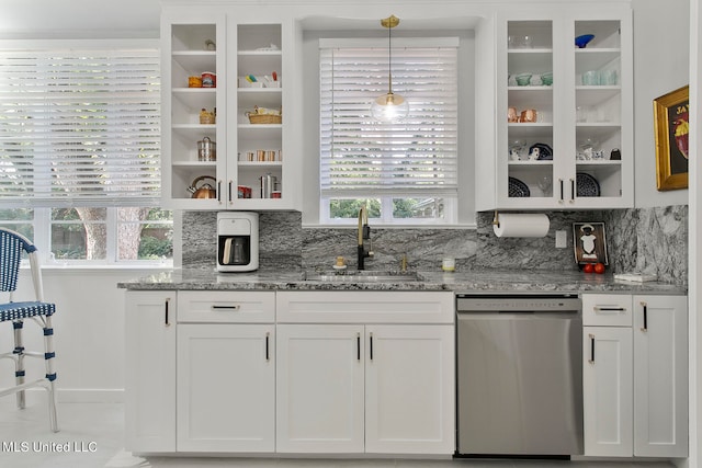 kitchen with white cabinetry, dishwasher, and a healthy amount of sunlight