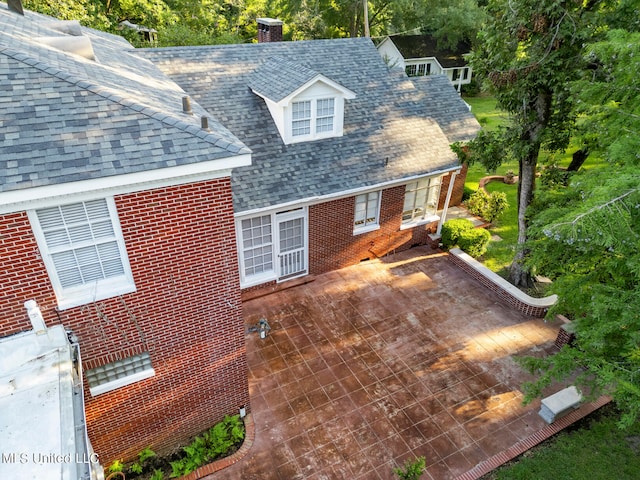 exterior space with a patio area