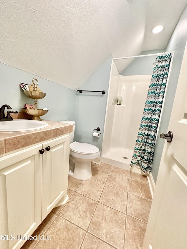 bathroom featuring tile patterned floors, vanity, toilet, and a shower with shower curtain