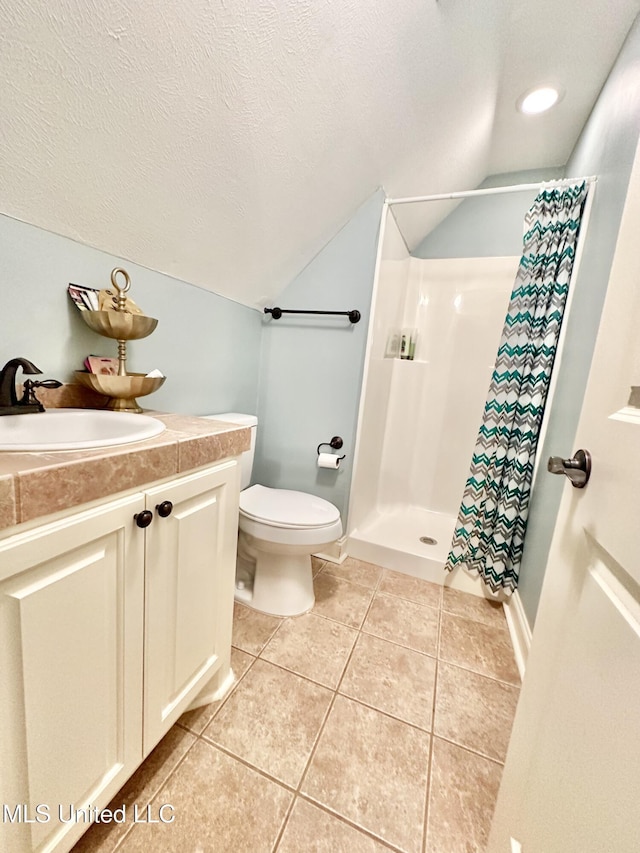 715 Tortoise Rdg, Brandon, MS 39047 - full bath featuring lofted ceiling, tile patterned floors, a shower with shower curtain, a textured ceiling, and vanity