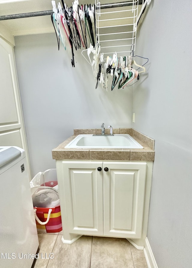 715 Tortoise Rdg, Brandon, MS 39047 - bathroom featuring a sink and tile patterned flooring
