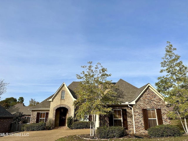 715 Tortoise Rdg, Brandon, MS 39047 - view of front of property featuring brick siding and a shingled roof
