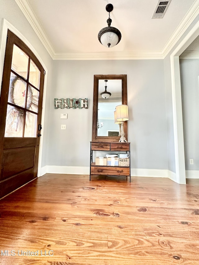 715 Tortoise Rdg, Brandon, MS 39047 - entrance foyer featuring wood finished floors and ornamental molding