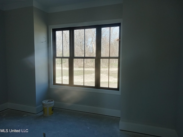 1400 Bayou Dr, Indianola, MS 38751 - empty room featuring baseboards and healthy amount of natural light