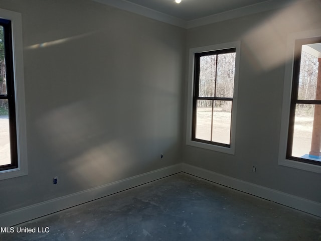 1400 Bayou Dr, Indianola, MS 38751 - unfurnished room featuring unfinished concrete floors, baseboards, and plenty of natural light