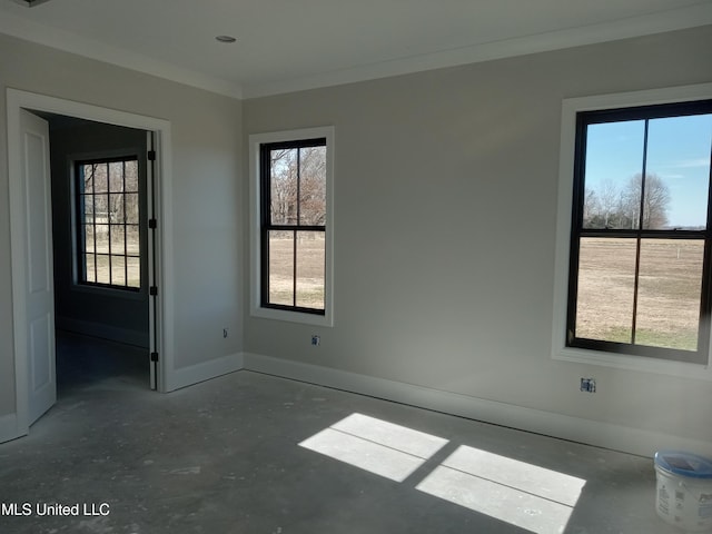 1400 Bayou Dr, Indianola, MS 38751 - unfurnished room featuring plenty of natural light, baseboards, and ornamental molding