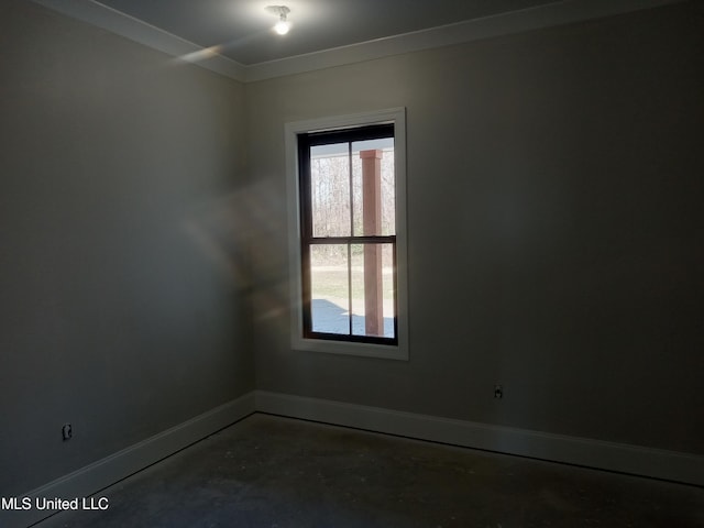 1400 Bayou Dr, Indianola, MS 38751 - spare room with baseboards, unfinished concrete floors, and ornamental molding