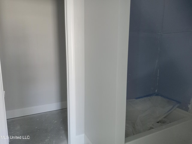 1400 Bayou Dr, Indianola, MS 38751 - bathroom with baseboards and concrete floors