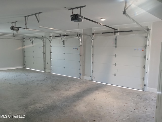 1400 Bayou Dr, Indianola, MS 38751 - garage featuring a garage door opener
