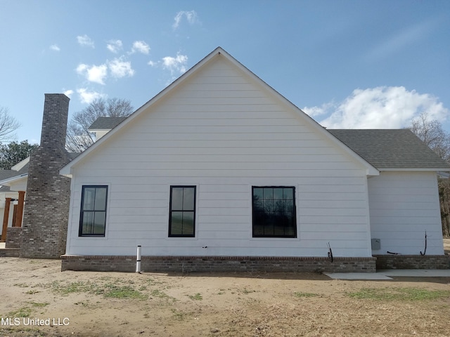 1400 Bayou Dr, Indianola, MS 38751 - view of side of home with roof with shingles