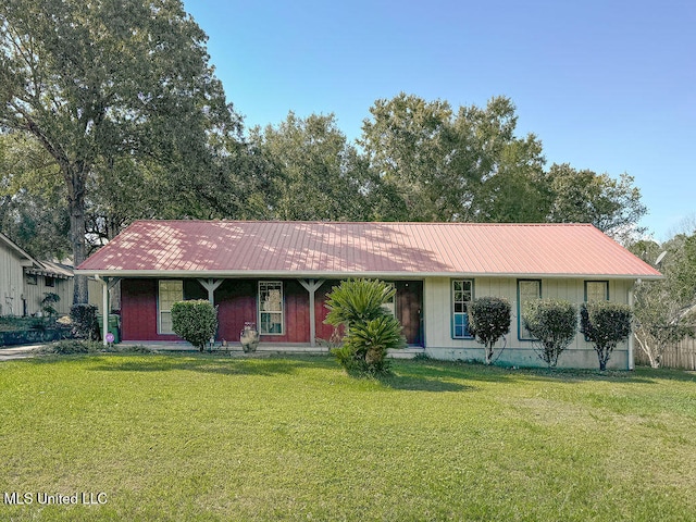 single story home with a front yard