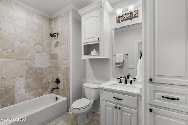 full bathroom with vanity, tiled shower / bath combo, and toilet