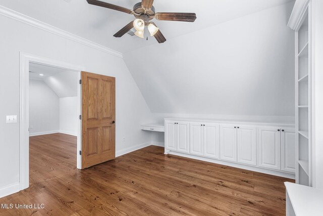 additional living space with lofted ceiling, wood-type flooring, and ceiling fan