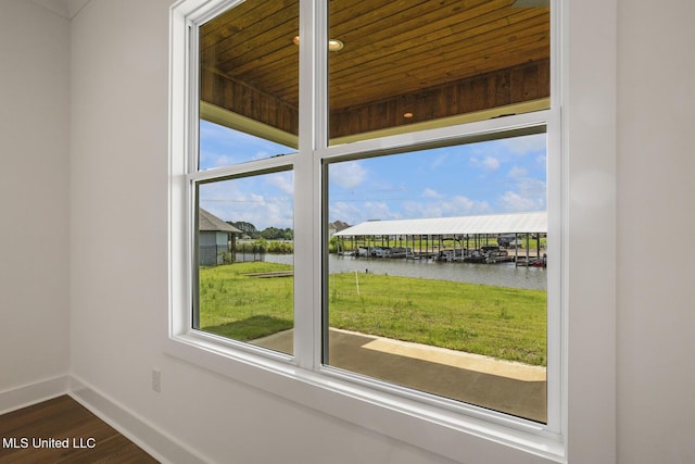 101 Harbour Lndg, Madison, MS 39110 - doorway featuring a water view, wood ceiling, baseboards, and dark wood-style floors