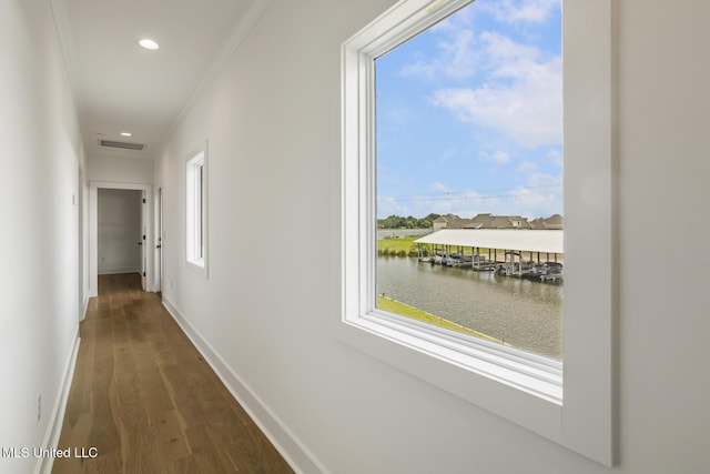 101 Harbour Lndg, Madison, MS 39110 - hallway with dark wood-type flooring, a water view, baseboards, crown molding, and recessed lighting