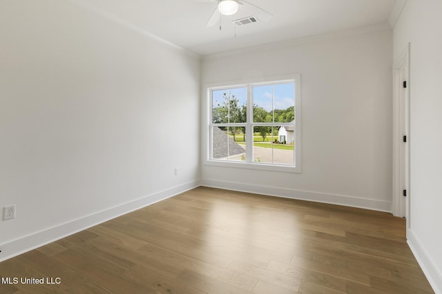 101 Harbour Lndg, Madison, MS 39110 - empty room featuring a ceiling fan, crown molding, wood finished floors, and baseboards