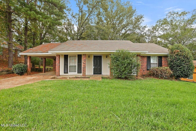 ranch-style home with a carport and a front lawn