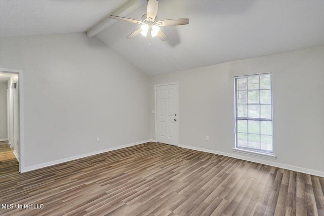 empty room featuring wood-type flooring, vaulted ceiling with beams, and ceiling fan