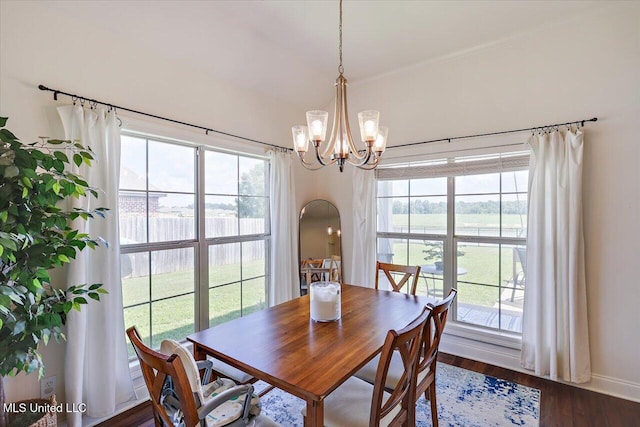 200 Falls Xing, Madison, MS 39110 - dining area featuring a water view, a chandelier, plenty of natural light, and dark wood finished floors