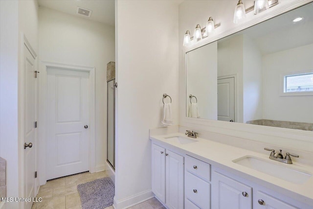 200 Falls Xing, Madison, MS 39110 - bathroom featuring double vanity and a shower stall
