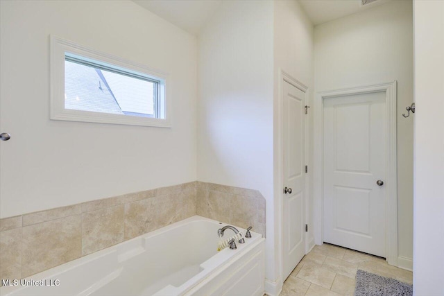200 Falls Xing, Madison, MS 39110 - bathroom featuring a bath and tile patterned floors