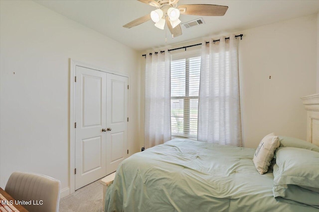 200 Falls Xing, Madison, MS 39110 - bedroom with light colored carpet, a closet, and ceiling fan