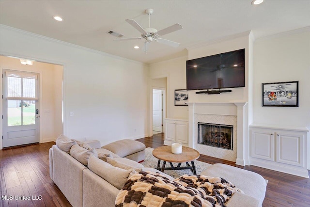 200 Falls Xing, Madison, MS 39110 - living room featuring crown molding, hardwood / wood-style floors, ceiling fan, a tile fireplace, and recessed lighting