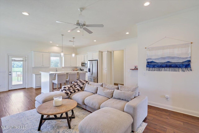 200 Falls Xing, Madison, MS 39110 - living room featuring recessed lighting, wood finished floors, ceiling fan, and ornamental molding