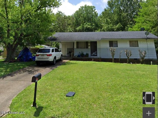 single story home with driveway and a front yard