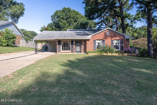 ranch-style home featuring a front lawn and a carport