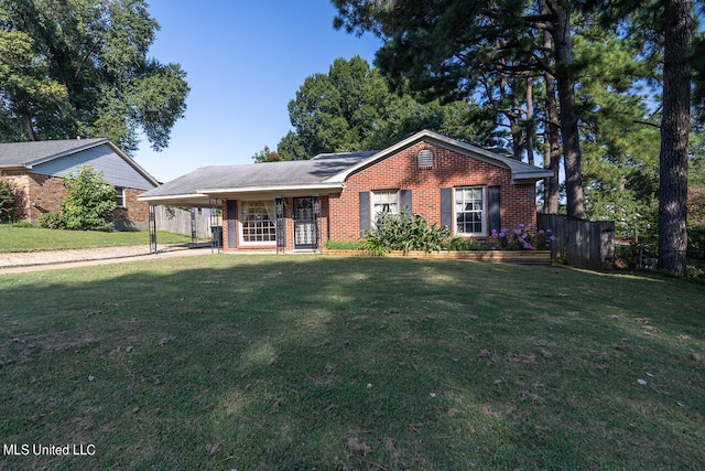 ranch-style home with a front lawn