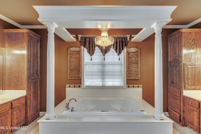 bathroom featuring vanity, an inviting chandelier, and a washtub