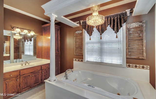 bathroom featuring vanity, ornate columns, ornamental molding, and a washtub