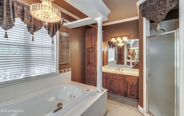 bathroom with vanity, independent shower and bath, crown molding, and ornate columns