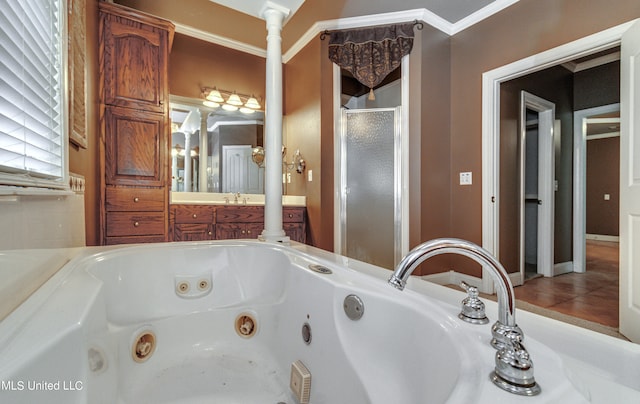 bathroom with vanity, independent shower and bath, ornamental molding, and tile patterned flooring