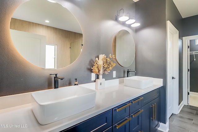 bathroom with vanity and hardwood / wood-style floors