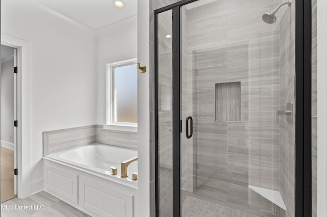 full bath with a garden tub and a shower stall