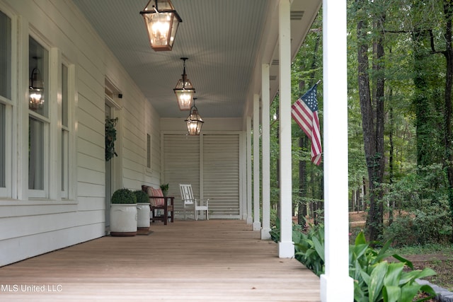 wooden terrace featuring a porch