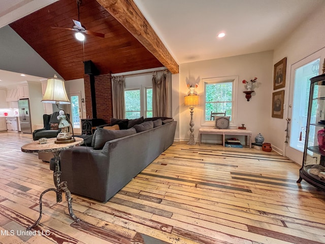 110 Quail Hollow Pl, Brandon, MS 39047 - living area featuring a wood stove, light wood-style floors, ceiling fan, healthy amount of natural light, and recessed lighting