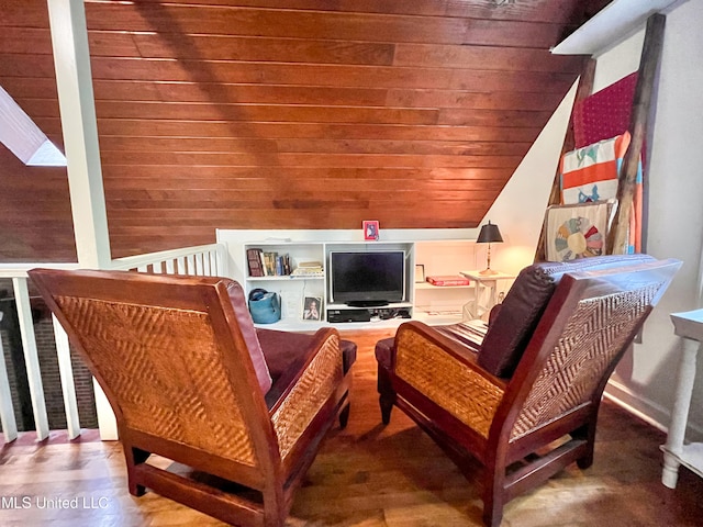 living area with wood ceiling, hardwood / wood-style flooring, wooden walls, and lofted ceiling